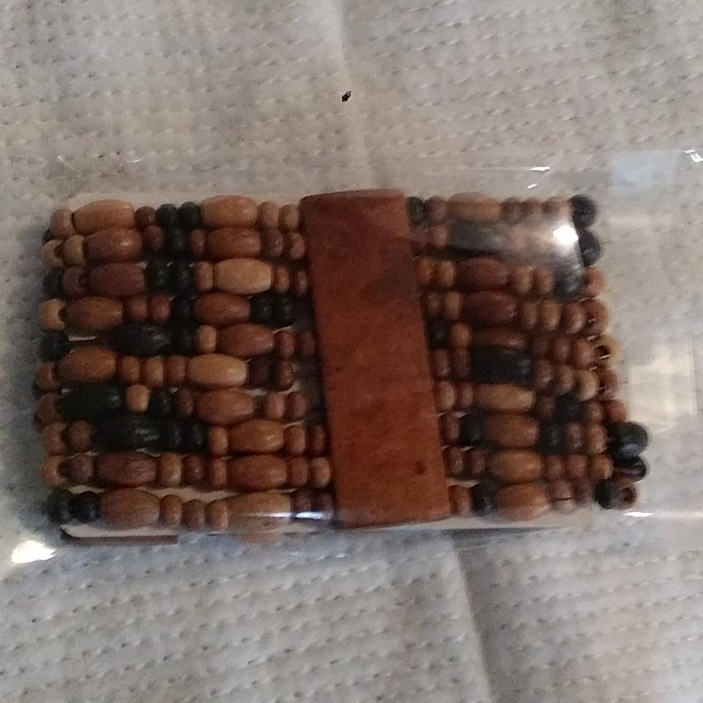 Wooden stretch beaded bracelet with natural tones.
